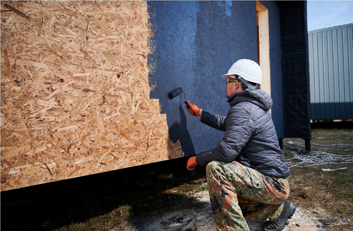 male painter using paint roller doing exterior pa 2023 11 27 04 59 49 utc
